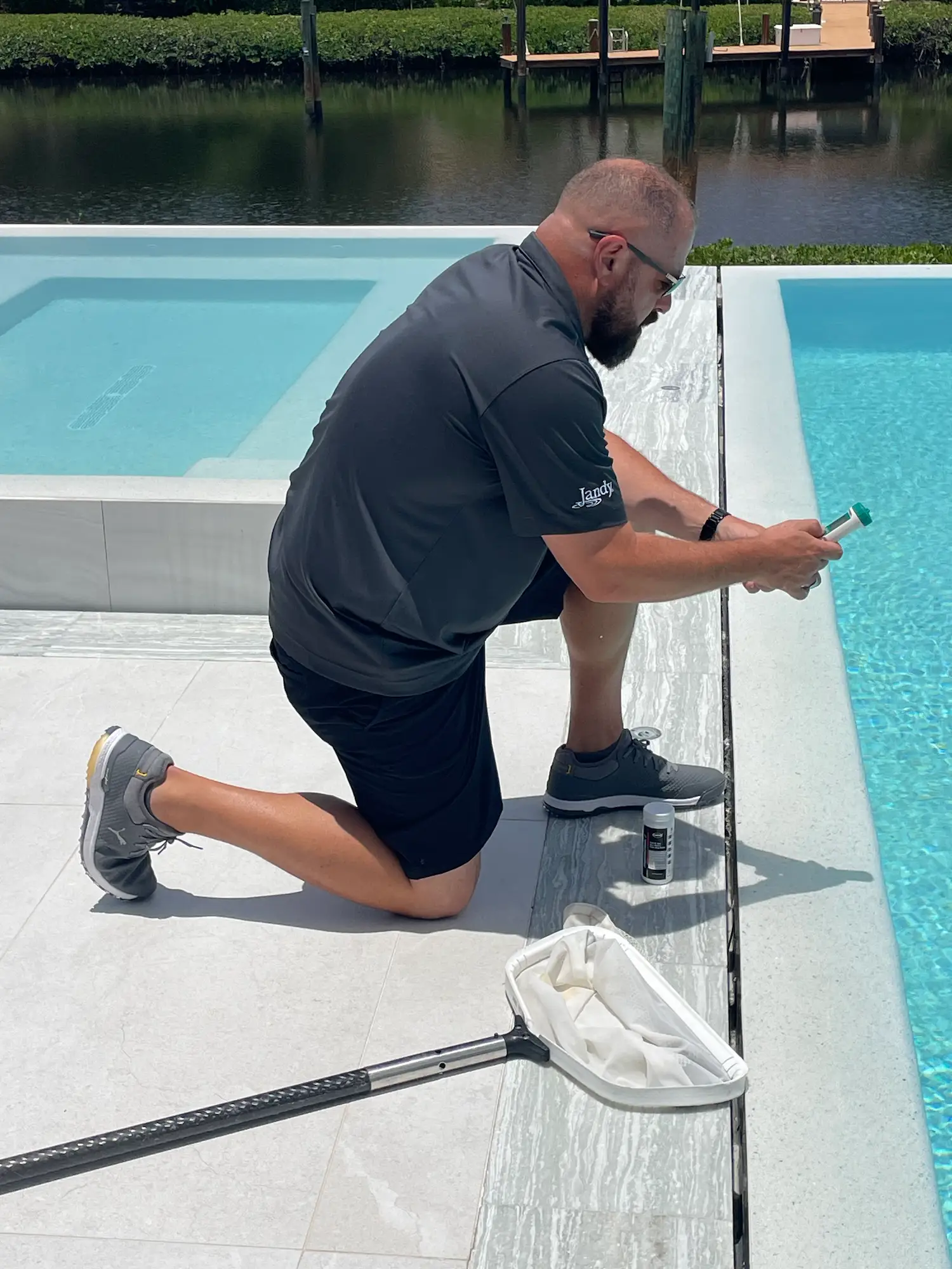 Swimming Pool inspection happening to start the pool cleaning process